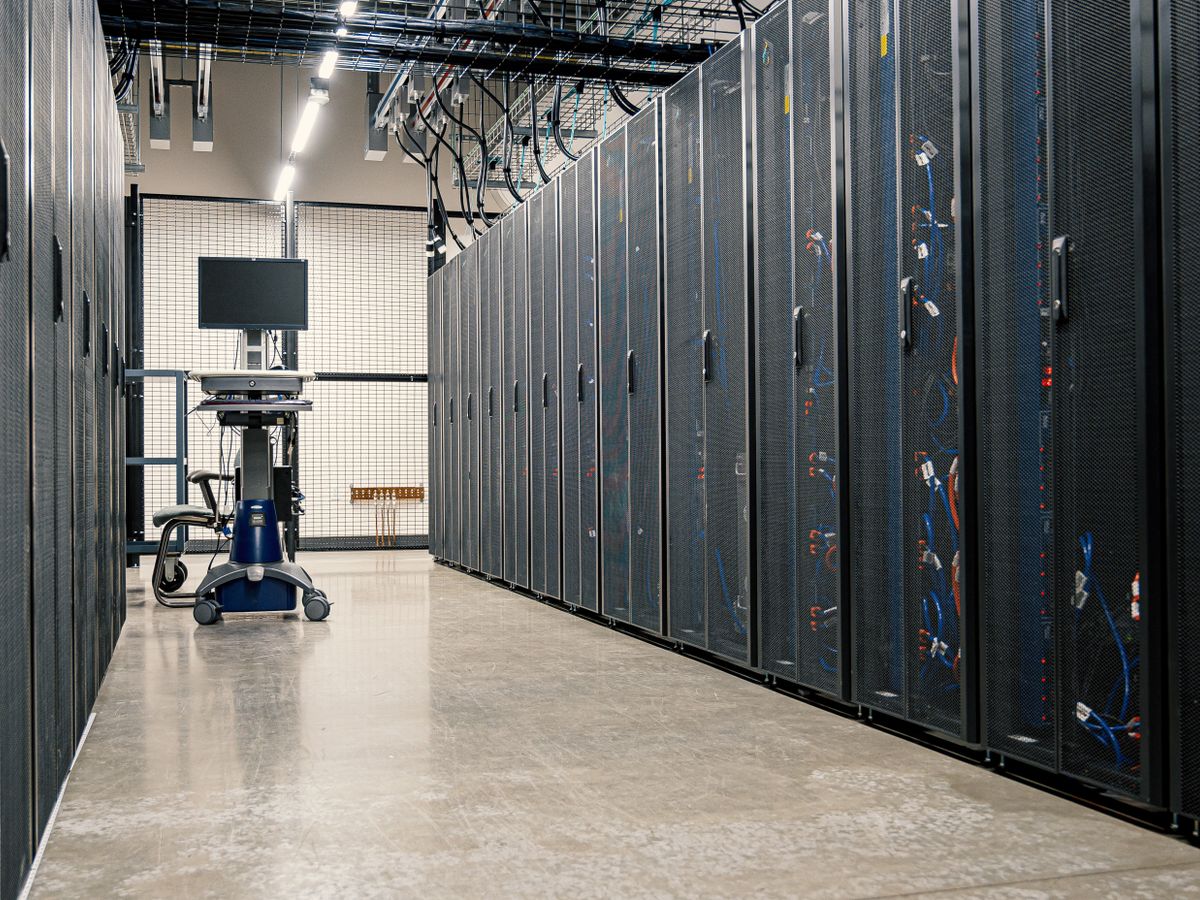 Steel cabinets housing servers and networking equipment