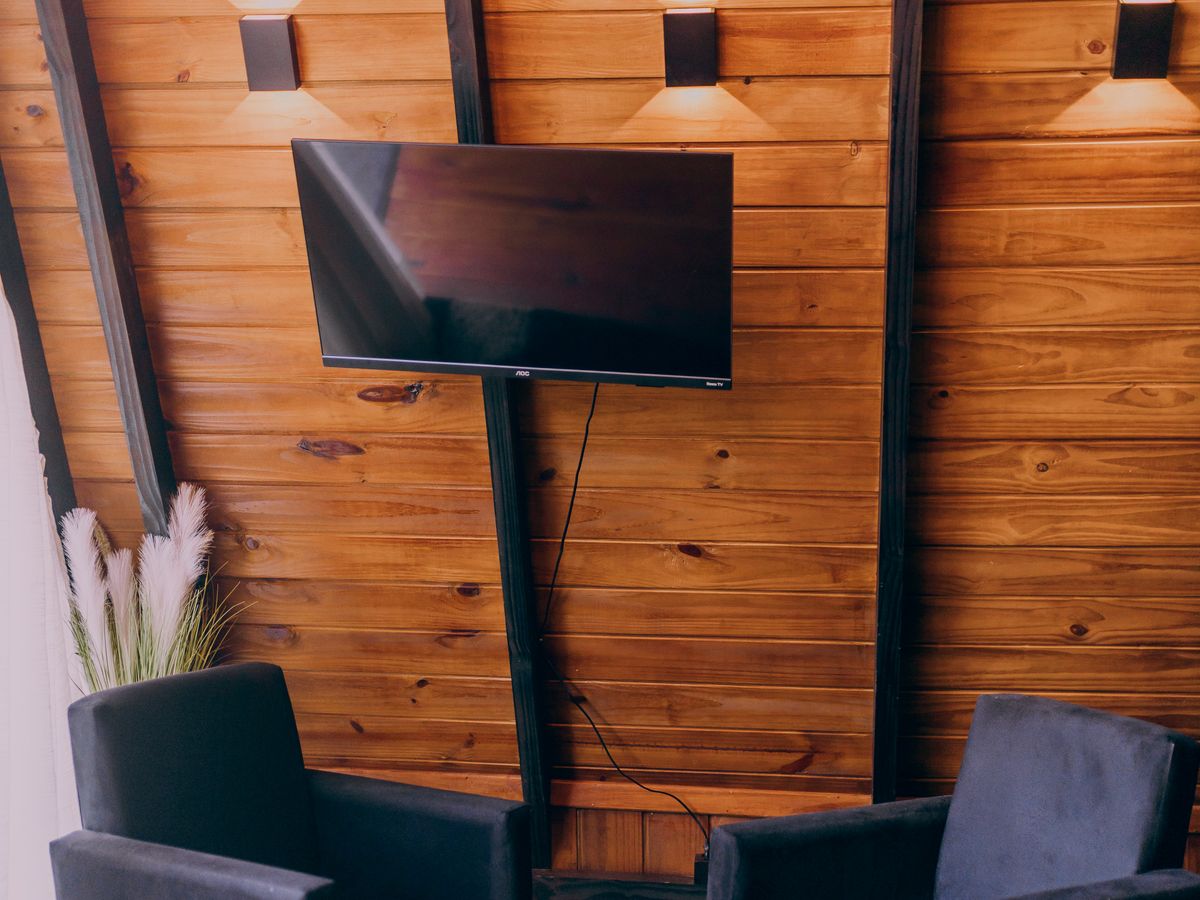 Wall-mounted television in a shared waiting area