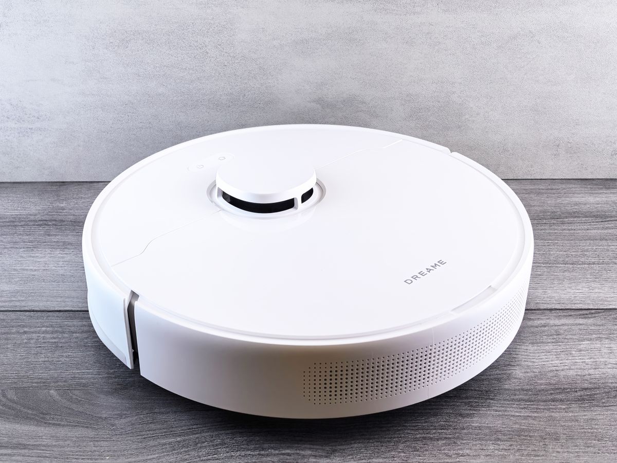 Robot vacuum cleaner on a wooden floor