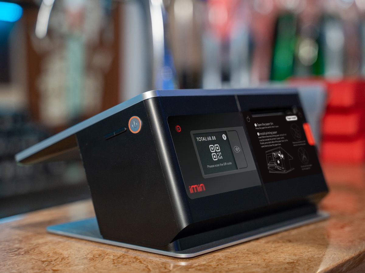 Touchscreen point-of-sale terminal on a retail counter