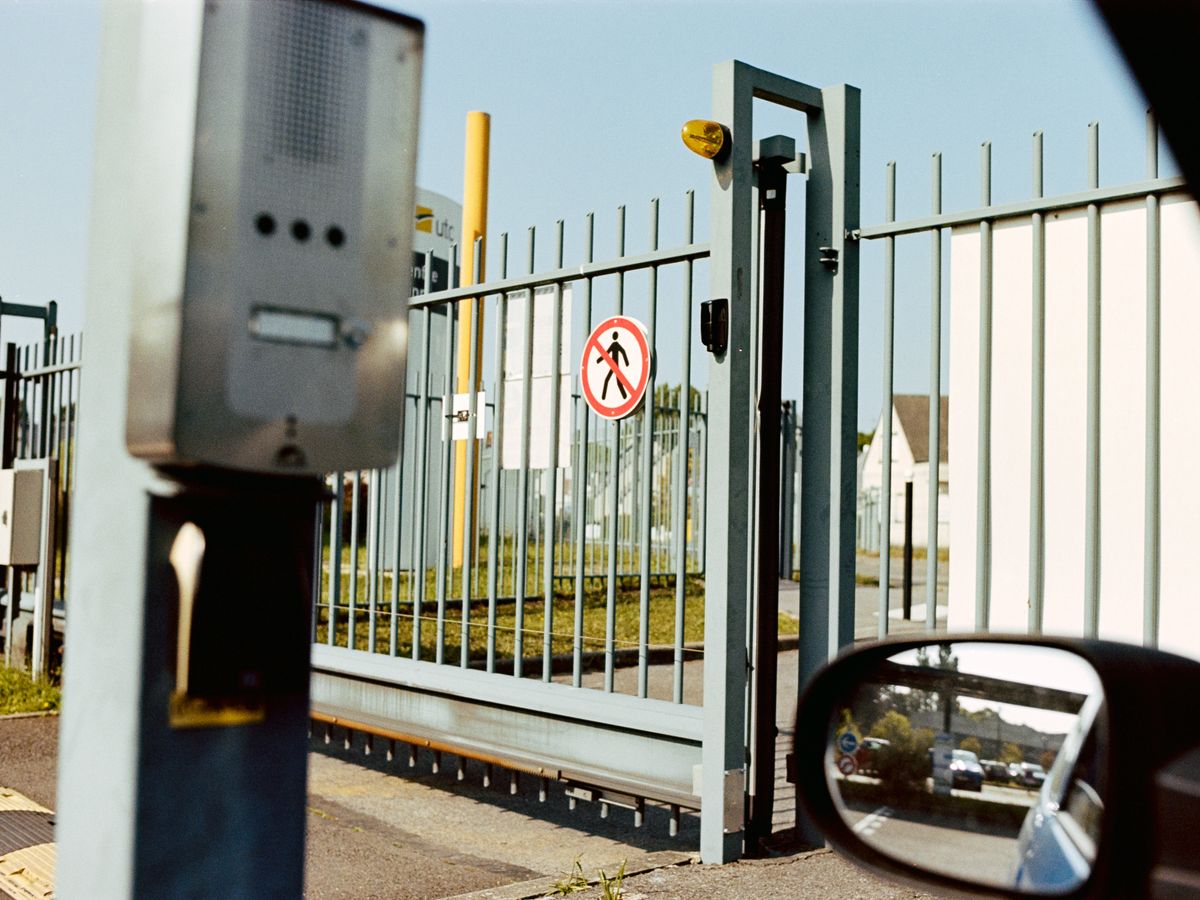 Security gate and intercom at a site entrance