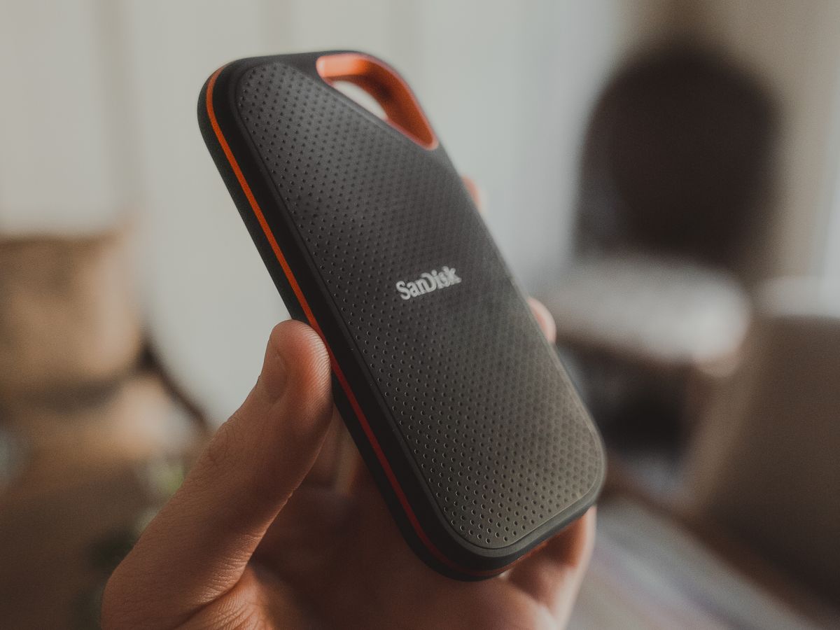 Portable solid-state drive held in hand